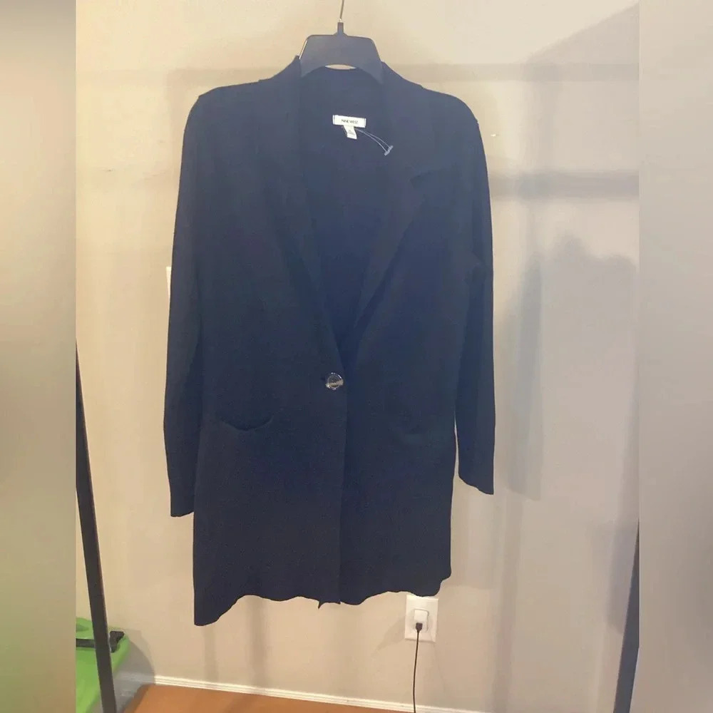 Nine West black cardigan. One button. 53% Cotton, 40% Nylon 7% Rayon.